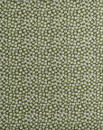 A close-up of a fabric pattern featuring a dense, small-scale print of tiny white flowers on an olive green background.