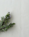 Bouquet of lavender on a white linen tablecloth background