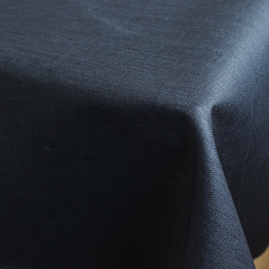Navy blue tablecloth close-up