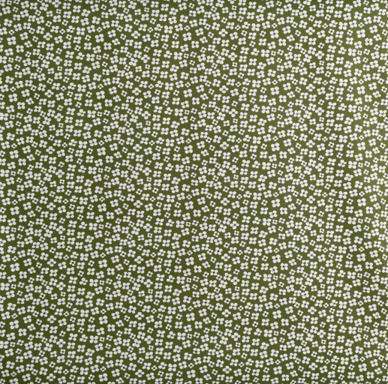 A close-up of a fabric pattern featuring a dense, small-scale print of tiny white flowers on an olive green background.