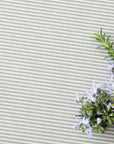 Herbs on a striped oilcloth background