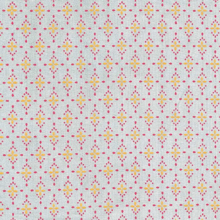 Patterned oilcloth with small geometric design on a light background