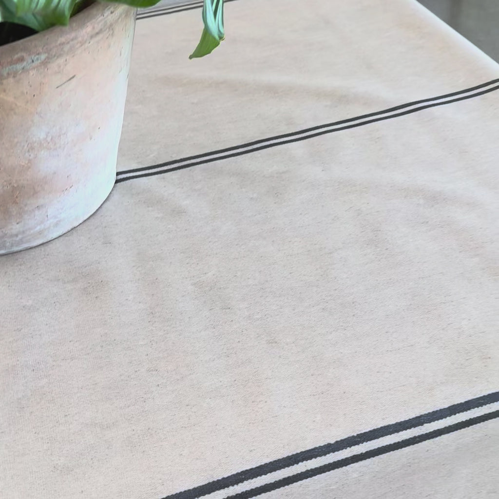 Grainsack design oilcloth with dark grey stripes