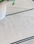 Grainsack design oilcloth with dark grey stripes