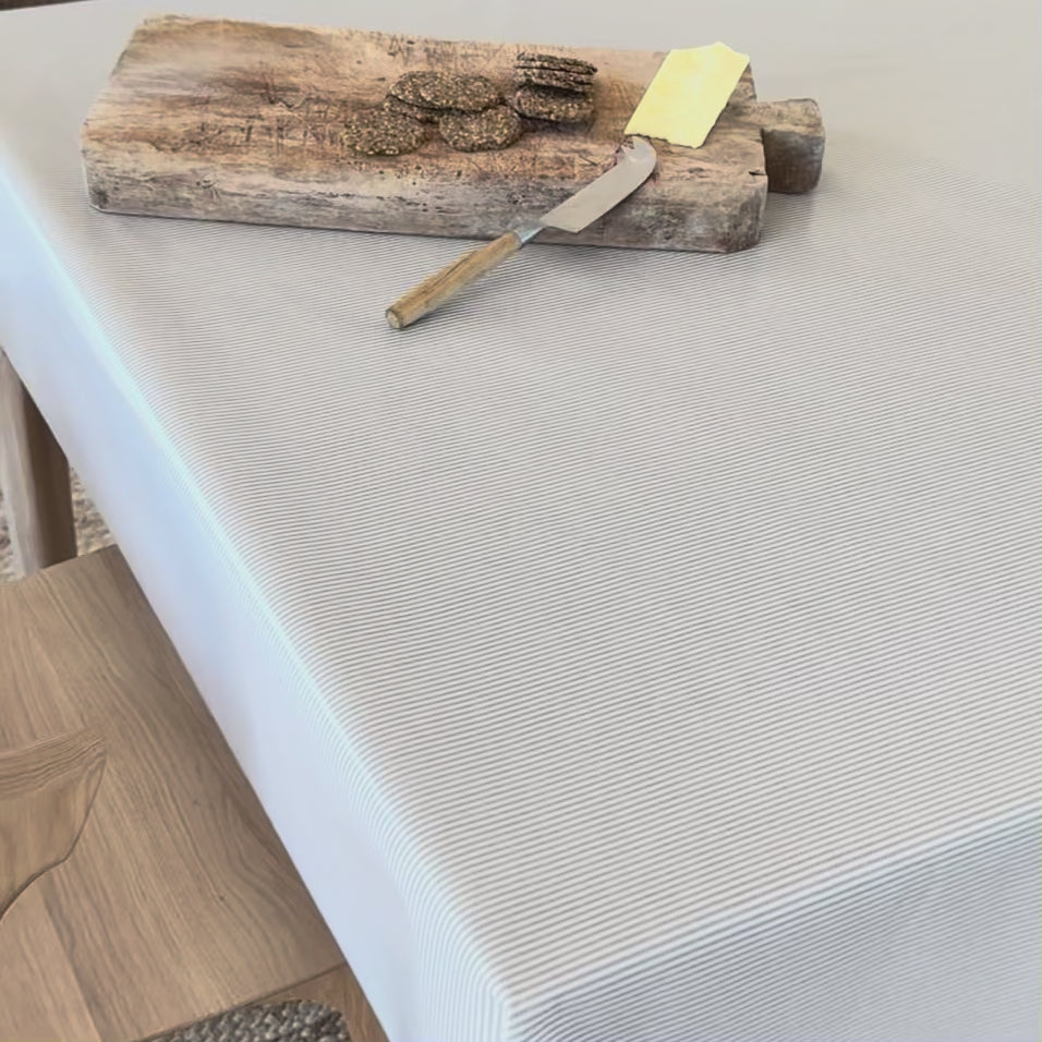 grey striped tablecloth oilcloth with a rustic cheese board